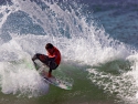 Adriano de Souza surfing cutback Trestles