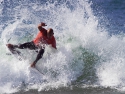 Kelly Slater fins out surfing