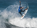 Miguel Pupo getting air surfing Trestles