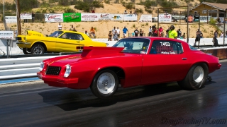 drag-racing-camaro-versus-ford-mustang